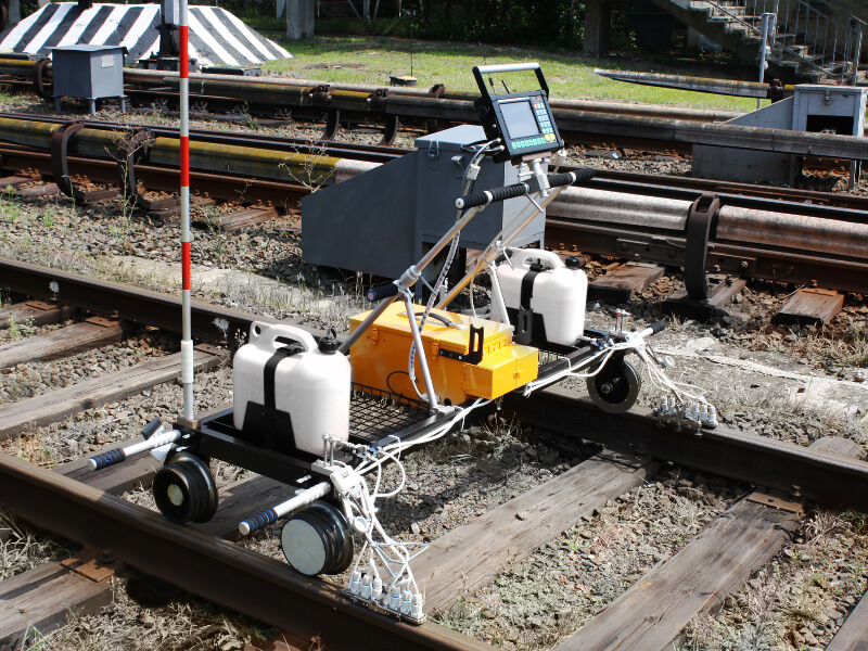 Ultrasonic rail tester UDS2-73 in the process of testing the rail track